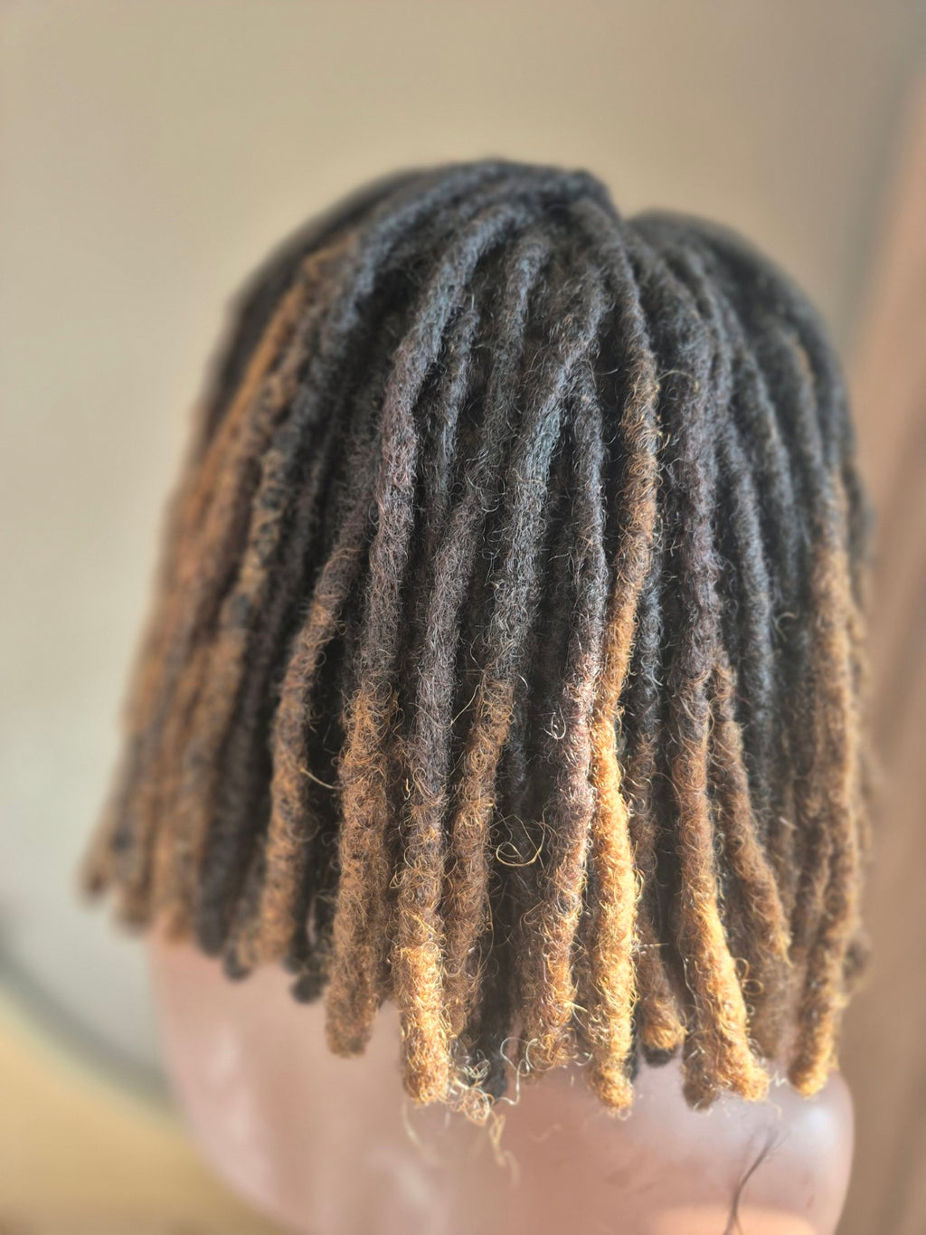 Back view of caramel ombre loc Crown