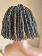 Back of short black loc bob