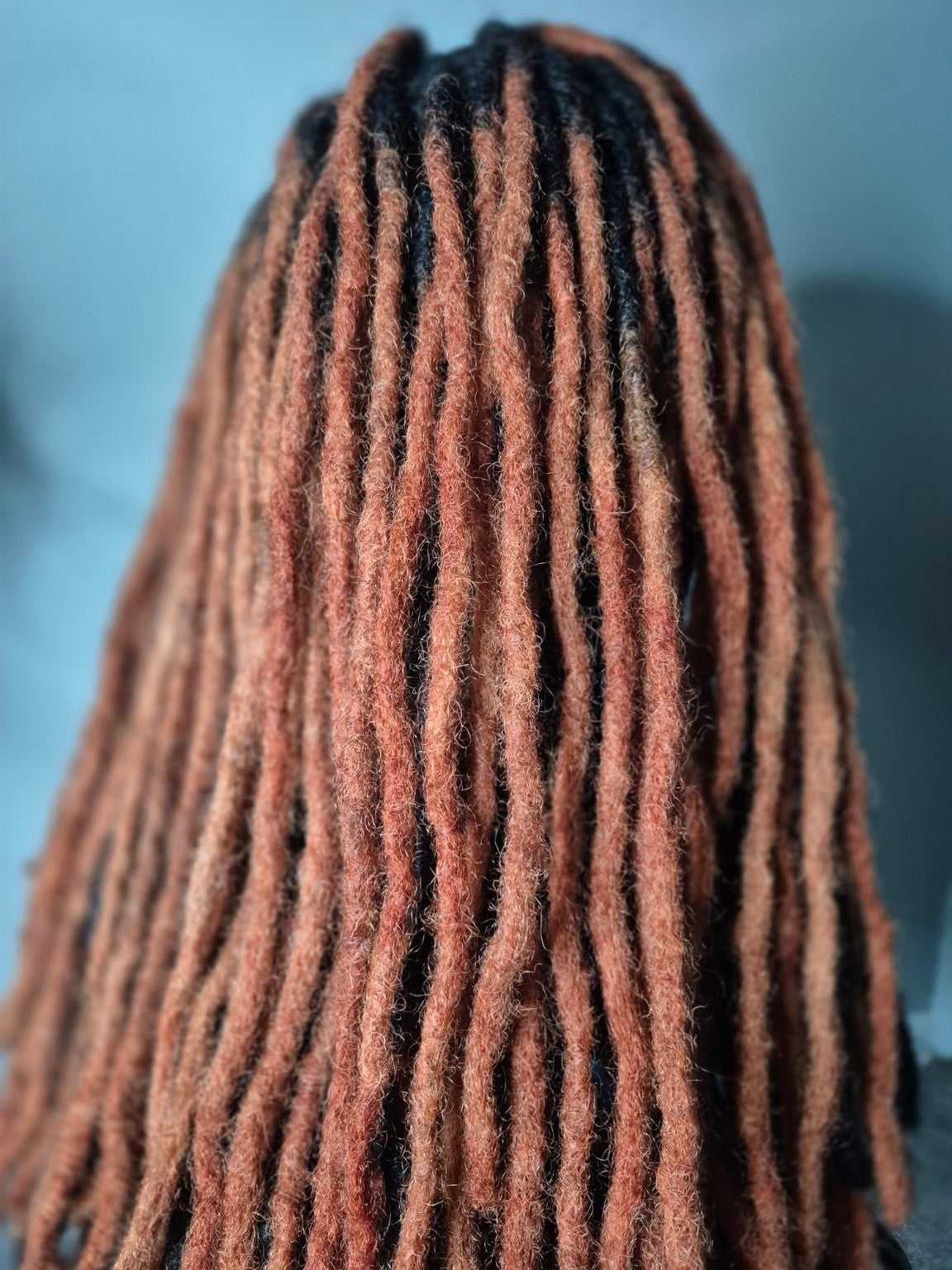 Rear of black and copper loc Crown