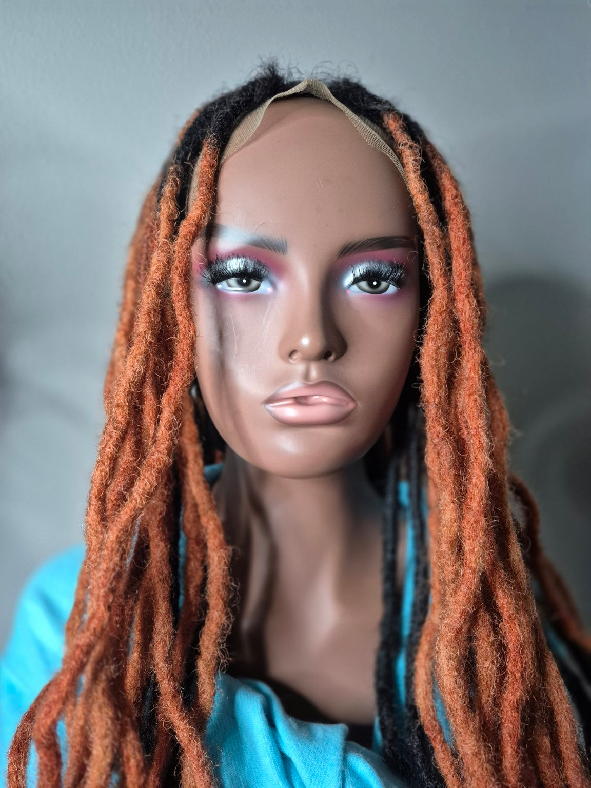 Close up front of copper loc Crown and lace