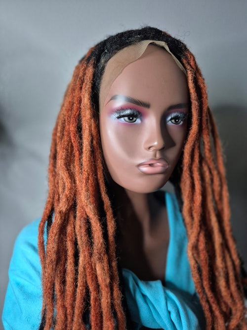 Angled front of black and copper loc Crown