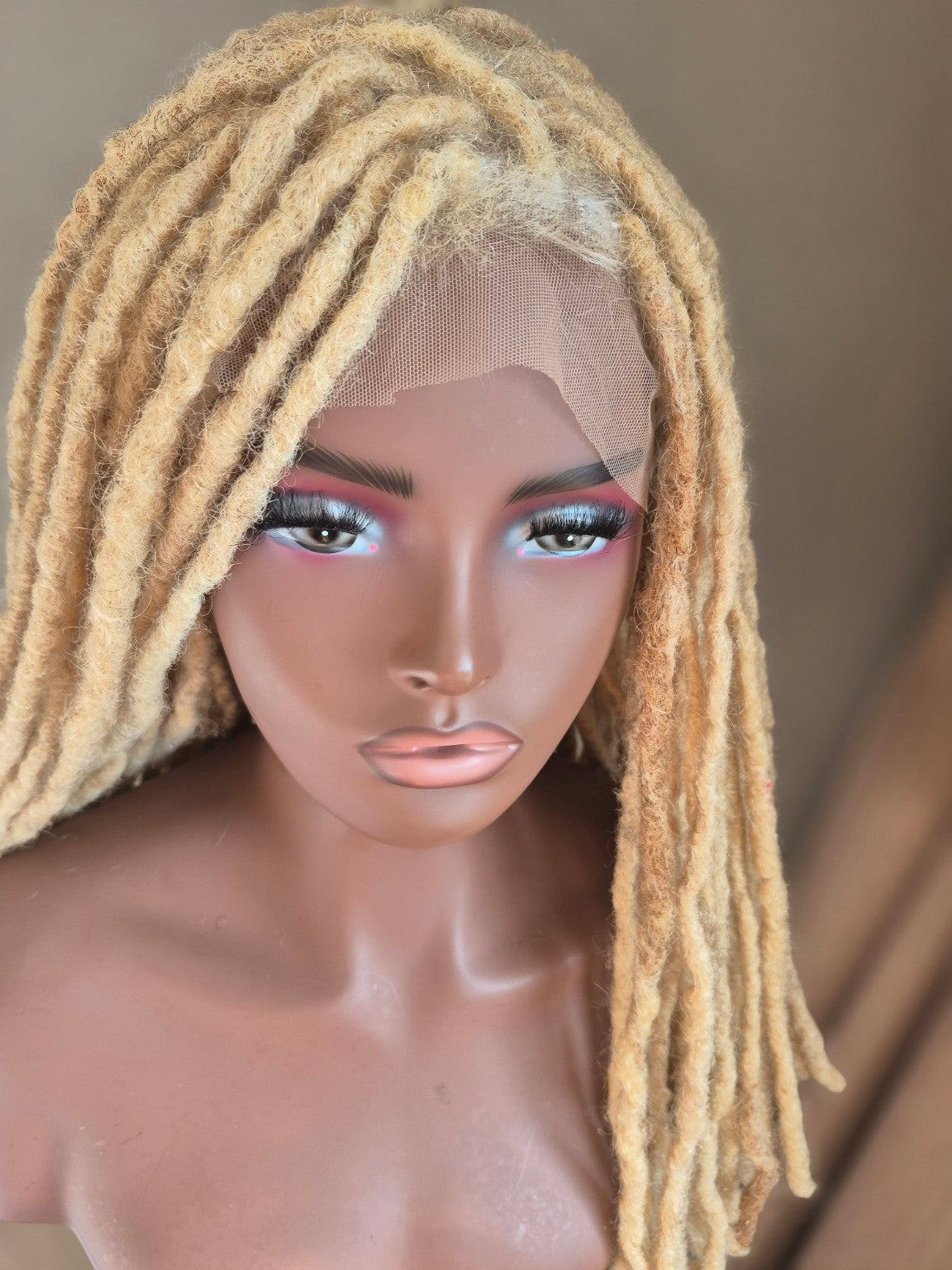 Front lace construction on blonde loc Crown