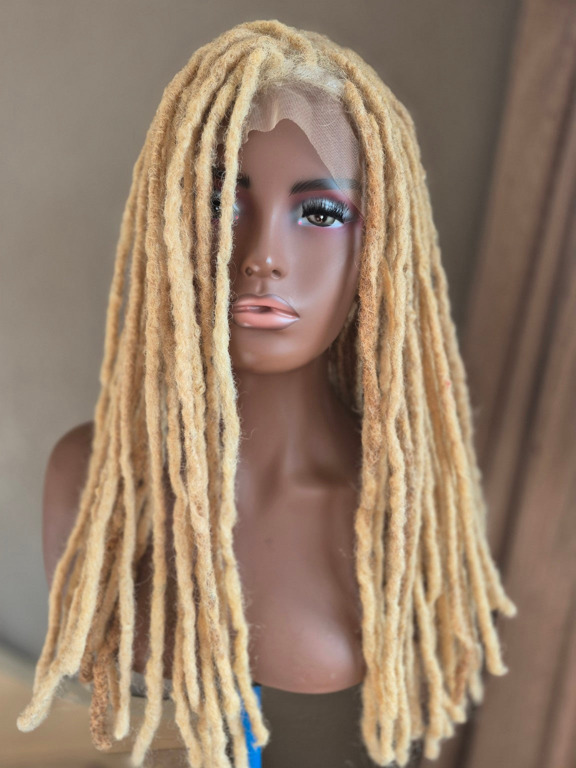 Long blonde loc Crown showing full length