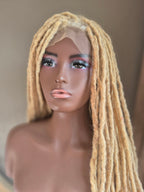 Angled view of long blonde loc Crown